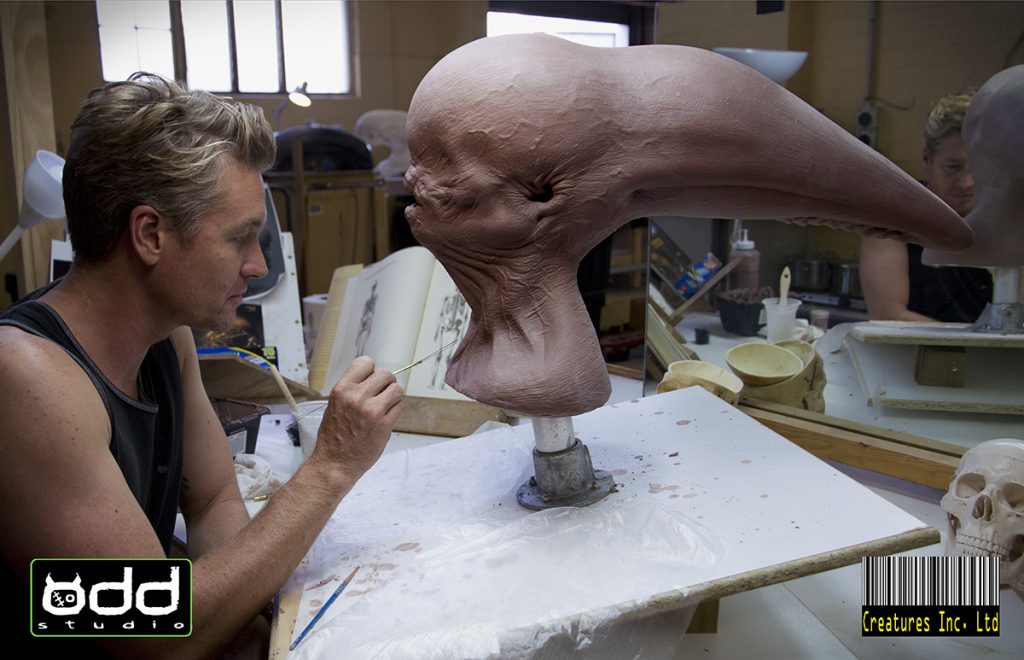 Adam sculpting and designing the adult Neomorph head.